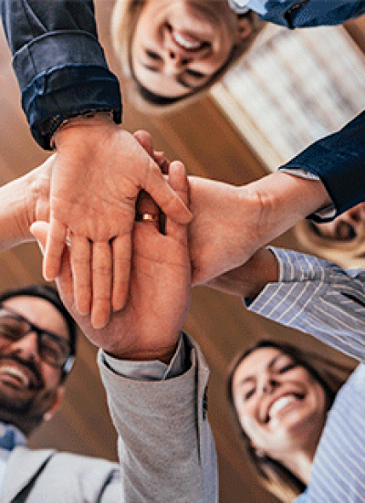 image-(1)-(2)1_0001_team-building-partnership-business-success-concept-bottom-view-business-people-putting-hands-togethe